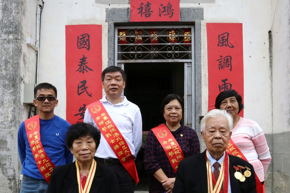 Surviving members of the East River column (from left) Jacky Lau Wai-tin, Lam Chun, secretary general Michael Lam Ming, Law Wai-fong, Lo King-fai, and Law Chi-hung, at the Law family mansion in Sha Tau Kok. Photo: Jonathan Wong