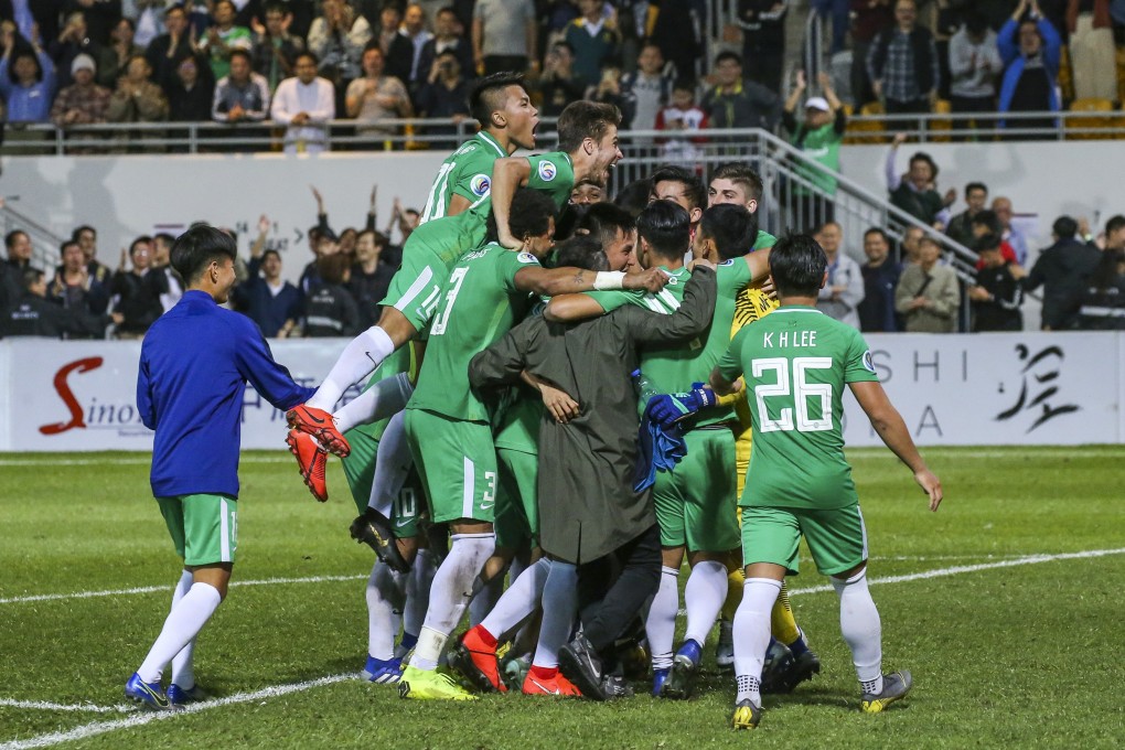 Hong Kong Premier League side Wofoo Tai Po celebrate after a penalty shoot-out win against Ryomyong SC in the AFC Cup play-off at Mong Kok Stadium. Photo: Felix Wong
