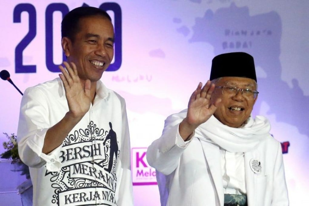 Indonesian President Joko Widodo with his running mate, Islamic scholar Ma’ruf Amin. Photo: EPA