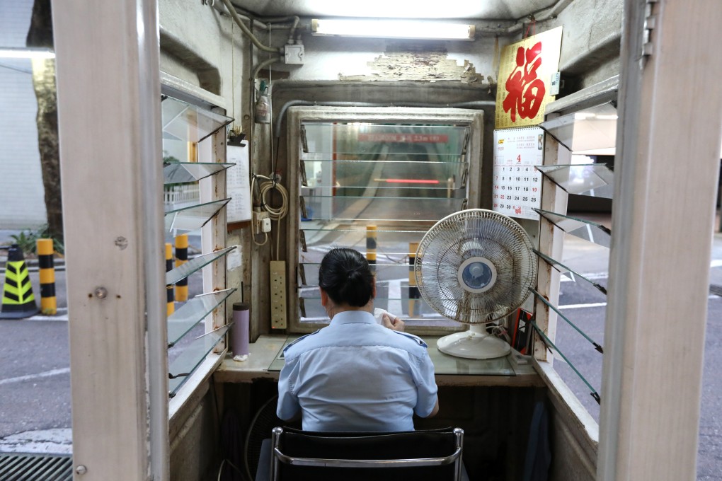 A quarter of security guards in Hong Kong work for 72 hours a week. Photo: Roy Issa
