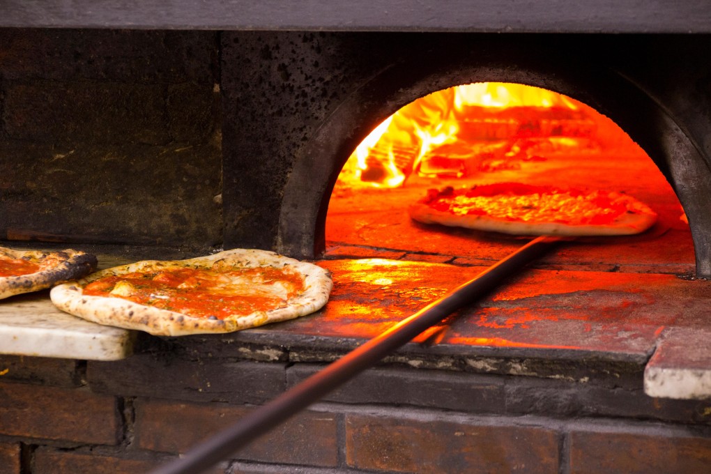 Three employees are accused of putting Miralax on at least one pizza. Photo: SCMP