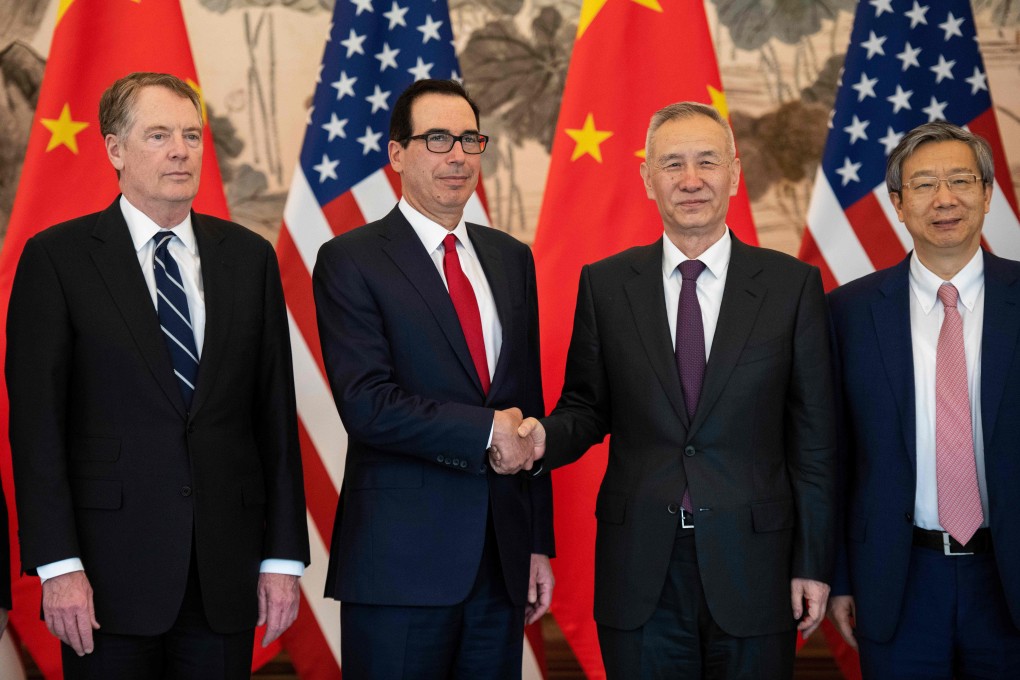 China’s Vice-Premier Liu He shakes hands with US Treasury Secretary Steven Mnuchin as People’s Bank of China Governor Yi Gang and US Trade Representative Robert Lighthizer pose in Beijing on March 29, as the two countries’ top negotiators began a fresh round of trade talks. Photo: AFP