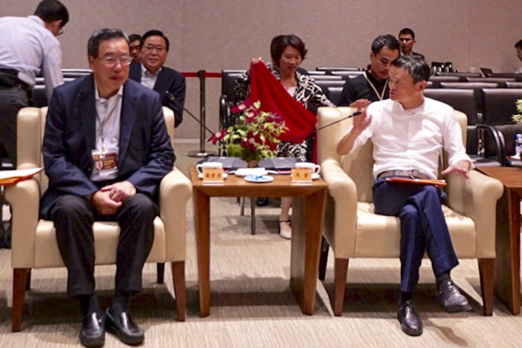 Legislative Council president Andrew Leung (left) with Alibaba founder Jack Ma on Wednesday. Photo: Pool