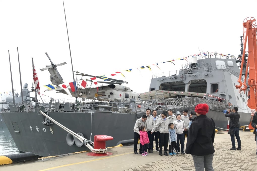 Members of the public visit the Japanese Suzutsuki destroyer during an open day in Qingdao on Wednesday. Photo: Minnie Chan