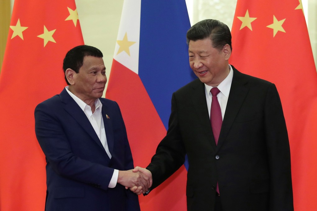 Philippine President Rodrigo Duterte shakes hands with Chinese President Xi Jinping, before the meeting at the Great Hall of People in Beijing on Thursday. Photo: Reuters