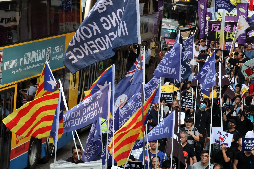 Supporters of Hong Kong independence take part in a protest on National Day, marching from Causeway Bay to the government headquarters in Tamar, Admiralty, on October 1, 2018. Photo: Felix Wong
