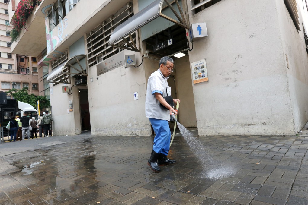 An elderly cleaner on duty at the Shanghai Street/Waterloo Road public toilet in Yau Ma Tei. A survey from March to April 2019 found 70 per cent of public toilet cleaners do not have a suitable place to eat their meals while on duty, with some forced to eat in washrooms. Photo: David Wong