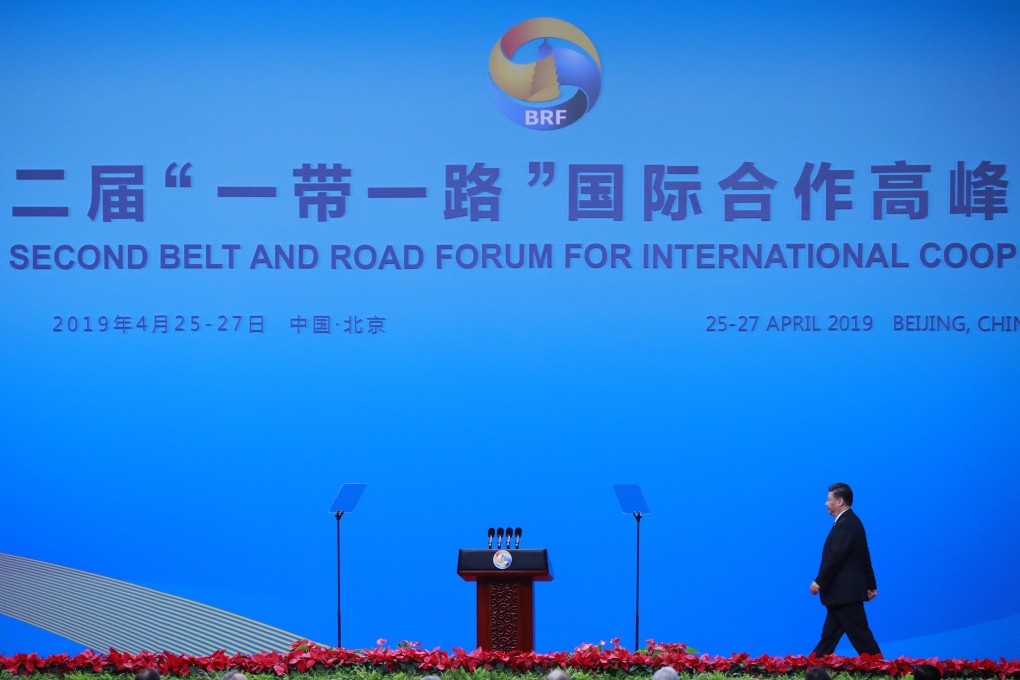 Xi Jinping walks on stage to deliver his speech. Photo: EPA-EFE