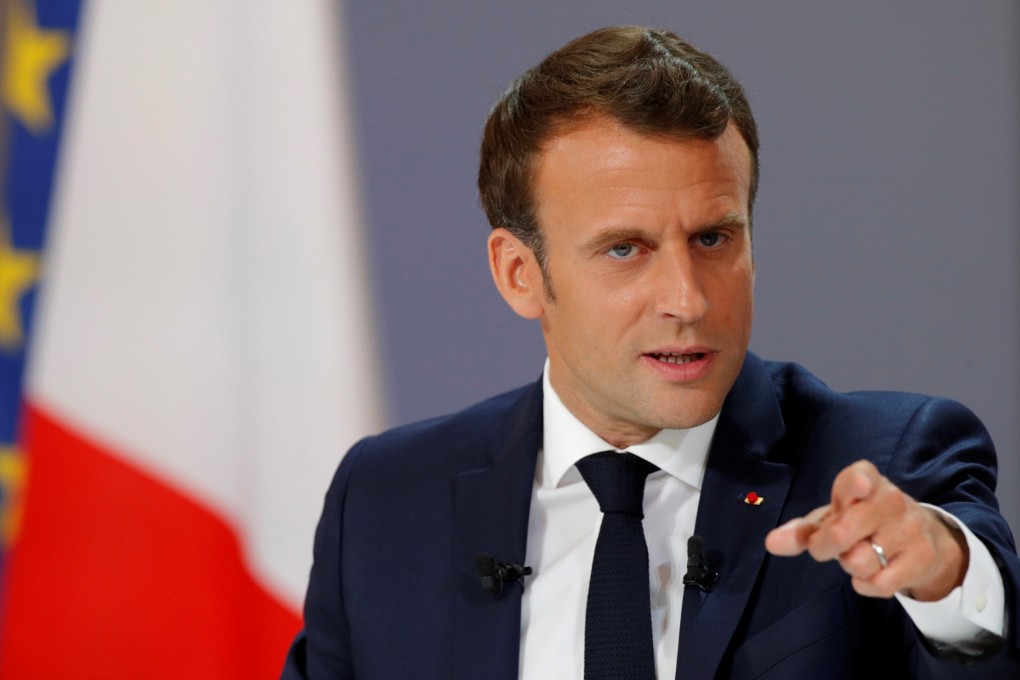 French President Emmanuel Macron speaks during a news conference to unveil his policy response to the “yellow vest” protests on Thursday. Photo: Reuters