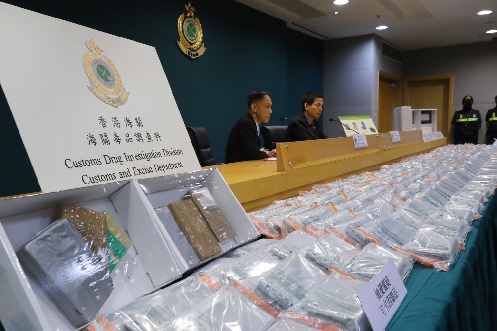 Officials with the Customs and Excise Department display the drugs seized this week in the departments biggest cocaine bust since 2012. Photo: Edmond So