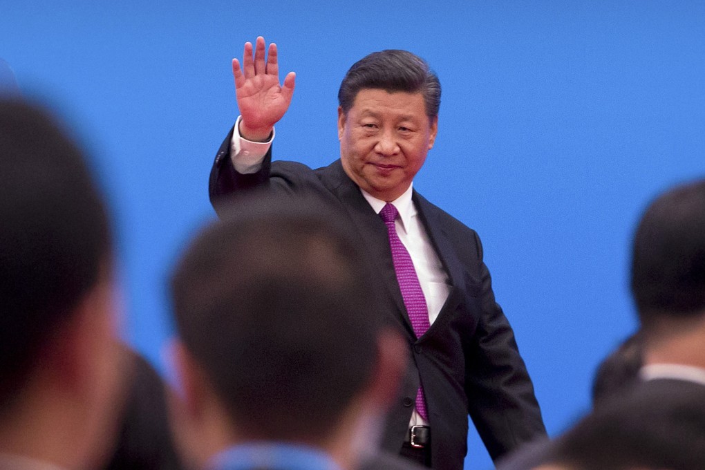 Xi Jinping waves as he leaves after a press conference at the closing of the Belt and Road Forum in Beijing on Saturday. Photo: AP