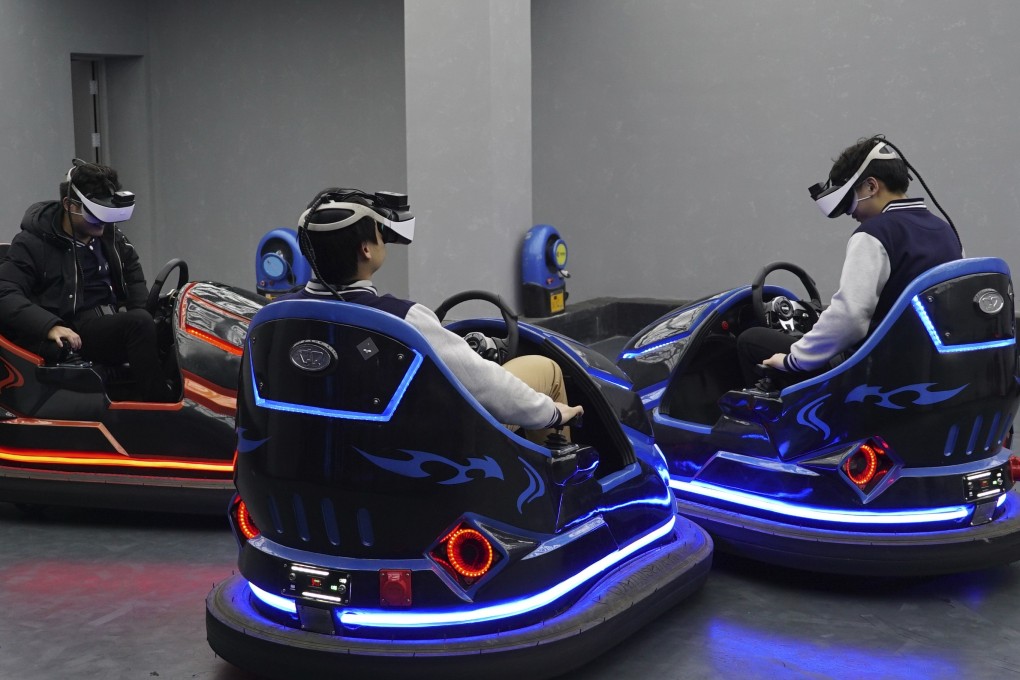 Virtual reality bumper cars are just one of the rides on offer at the Star VR theme park in Nanchang. Photo: AP