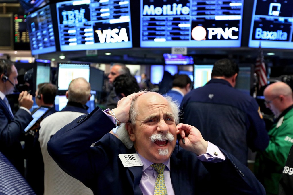 Traders on the floor of the New York Stock Exchange (NYSE) at the start of the trading day in New York on 20 January 2016. Photo: EPA