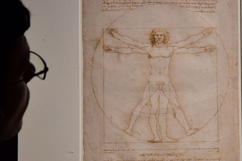 A visitor looks at the Leonardo da Vinci piece ‘Vitruvian Man’ in Milan in May 2015. May 2 marks the 500th anniversary of the death of the Renaissance artist. Photo: AFP
