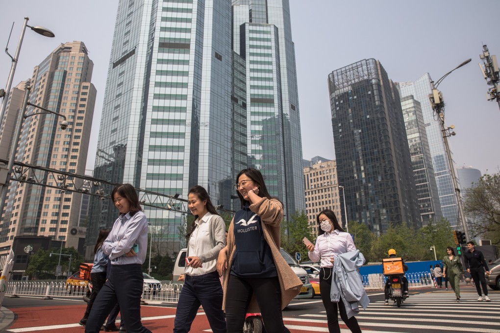 The per capita income of urban residents rose 7.9 per cent from a year earlier to 11,633 yuan combined for the first three months of the year, according to official data. Photo: EPA