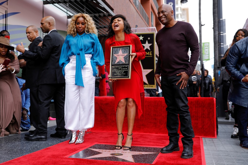 Singleton with Mary J Blige and actress Taraji P Henson, who had just received a star on Hollywood’s Walk of Fame in January 2019. Photo: Reuters