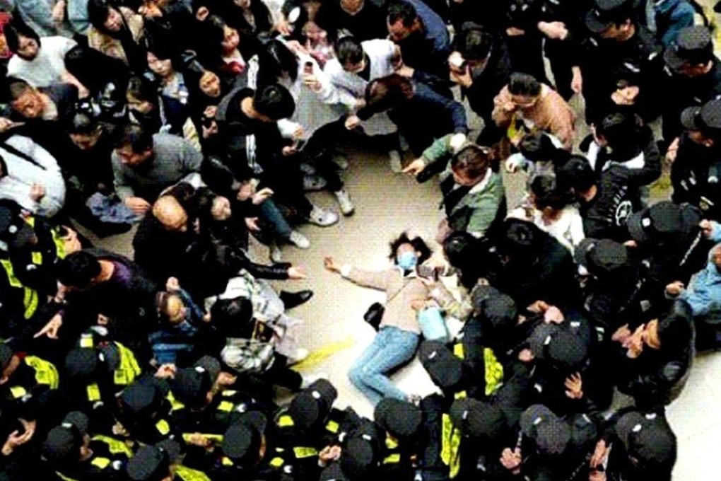 Dozens of students clashed with police and security staff at a college in eastern China after the discovery that a nursing course only provided a degree in home economics. Photo: Weibo