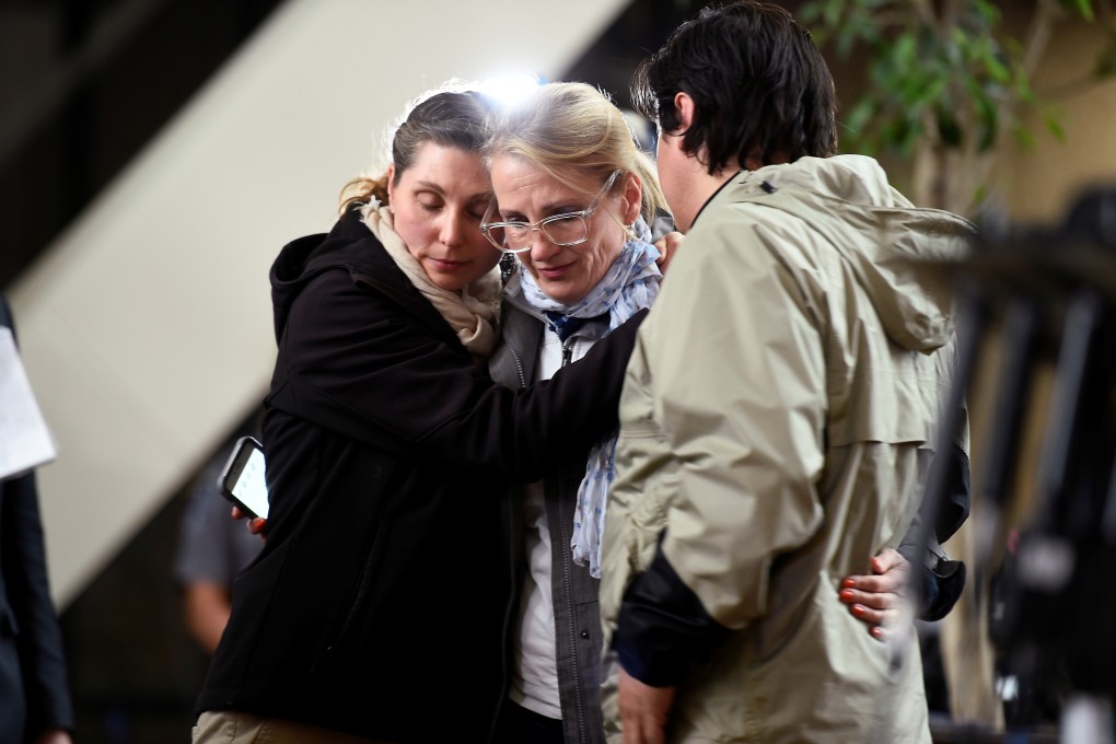 Jenelle Masterson and Sarah Kuhnen, both neighbours of Justine Ruszczyk Damond, react after the verdict of Mohamed Noor former Minnesota policeman. Photo: Reuters