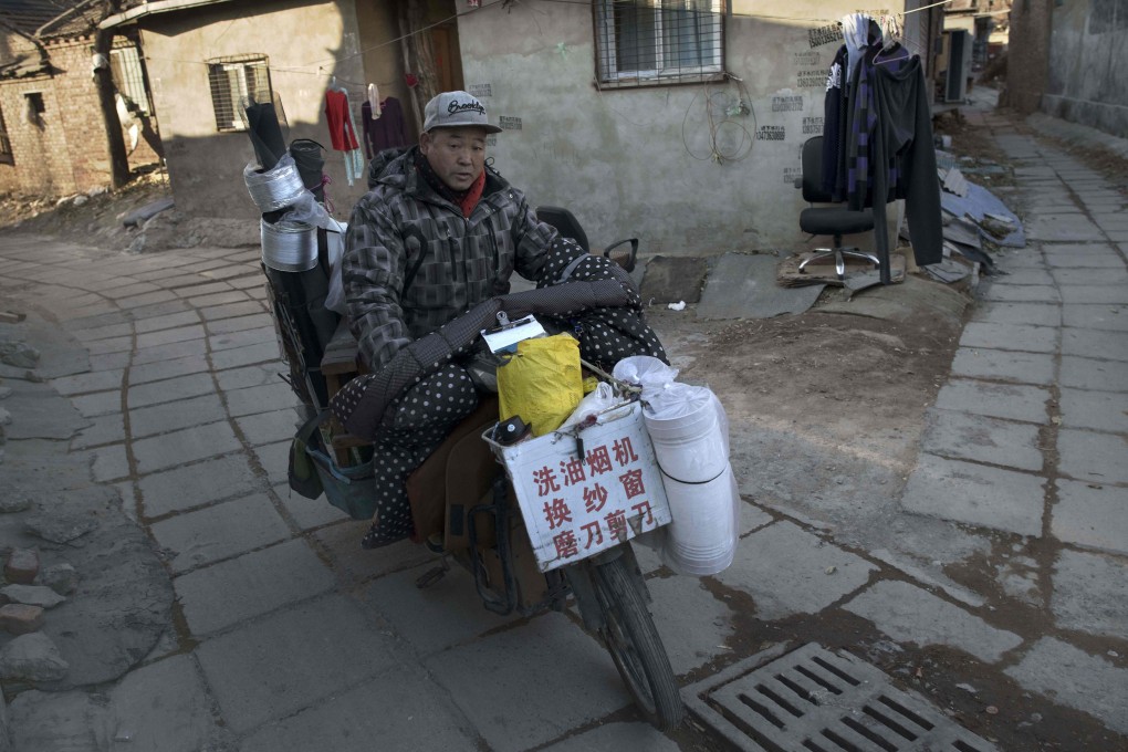 A by-law enacted last autumn has put e-bike riders in Beijing in the spotlight. Photo: AFP