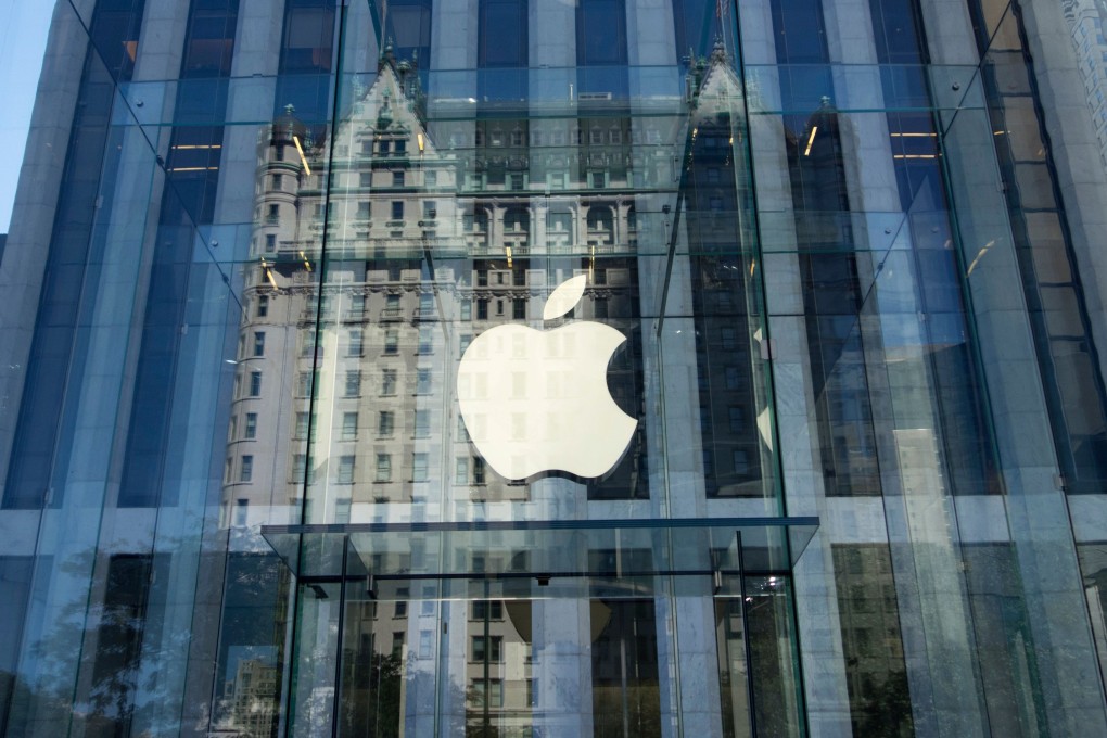The Apple logo at the entrance to the Fifth Ave. Apple store is seen in New York. Photo: AFP
