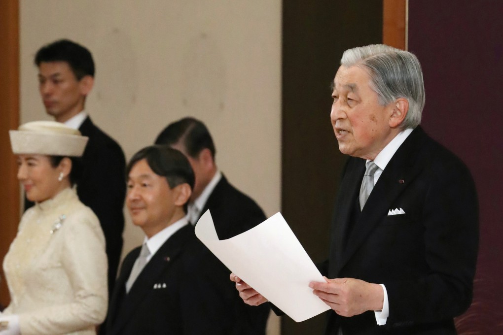 Japan's Emperor Akihito, flanked by Crown Prince Naruhito and Crown Princess Masako, delivers an abdication speech. Photo: Reuters