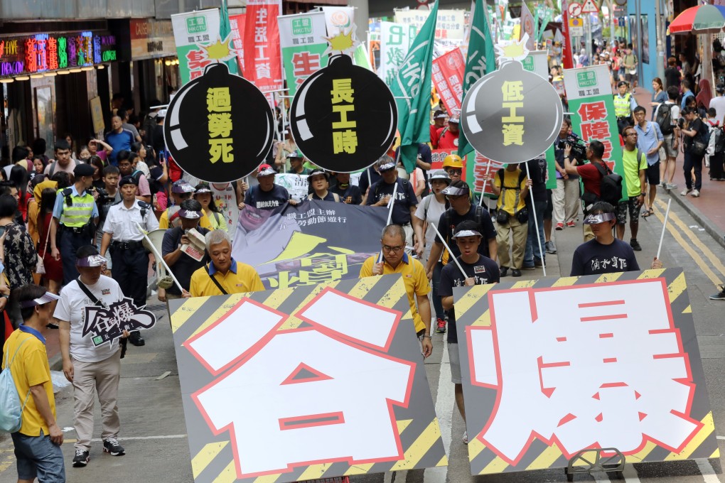 Labour activists and workers taking part in May Day marches. Photo: Dickson Lee