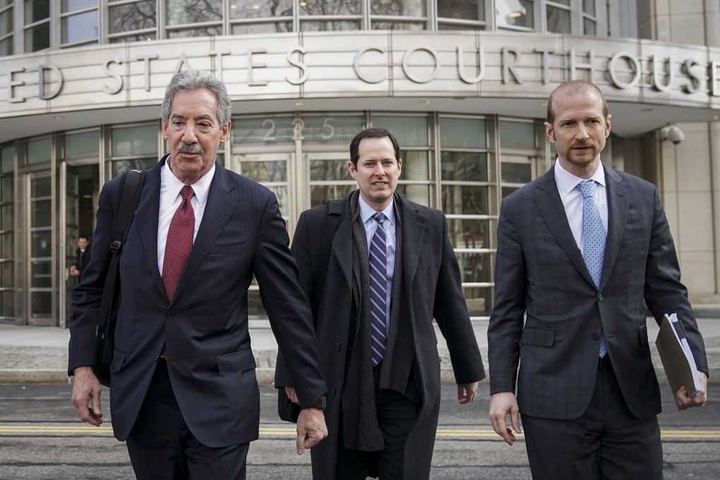 James Cole (left), lead defence lawyer for Huawei, leaves court with colleagues Michael Levy (centre) and David Bitkower (right) in March. Photo: AFP