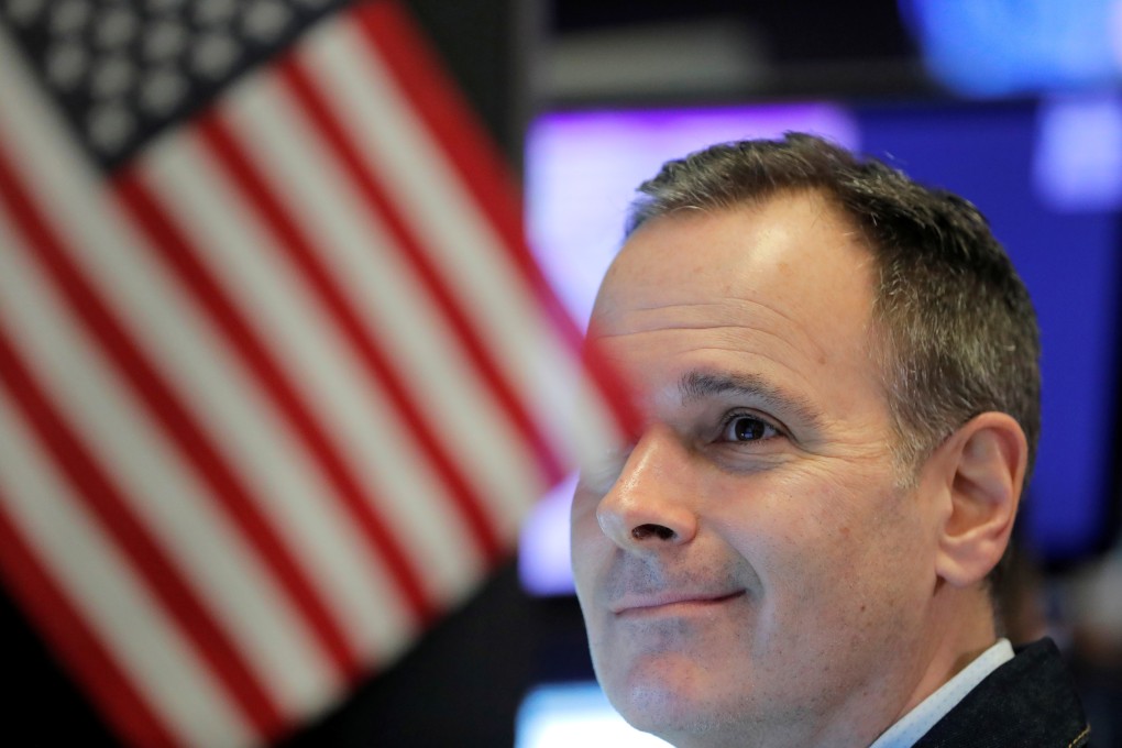 A trader works on the floor of the New York Stock Exchange. Even though the euro zone beat expectations in the first quarter, its growth was still far below that of the US. Photo: Reuters