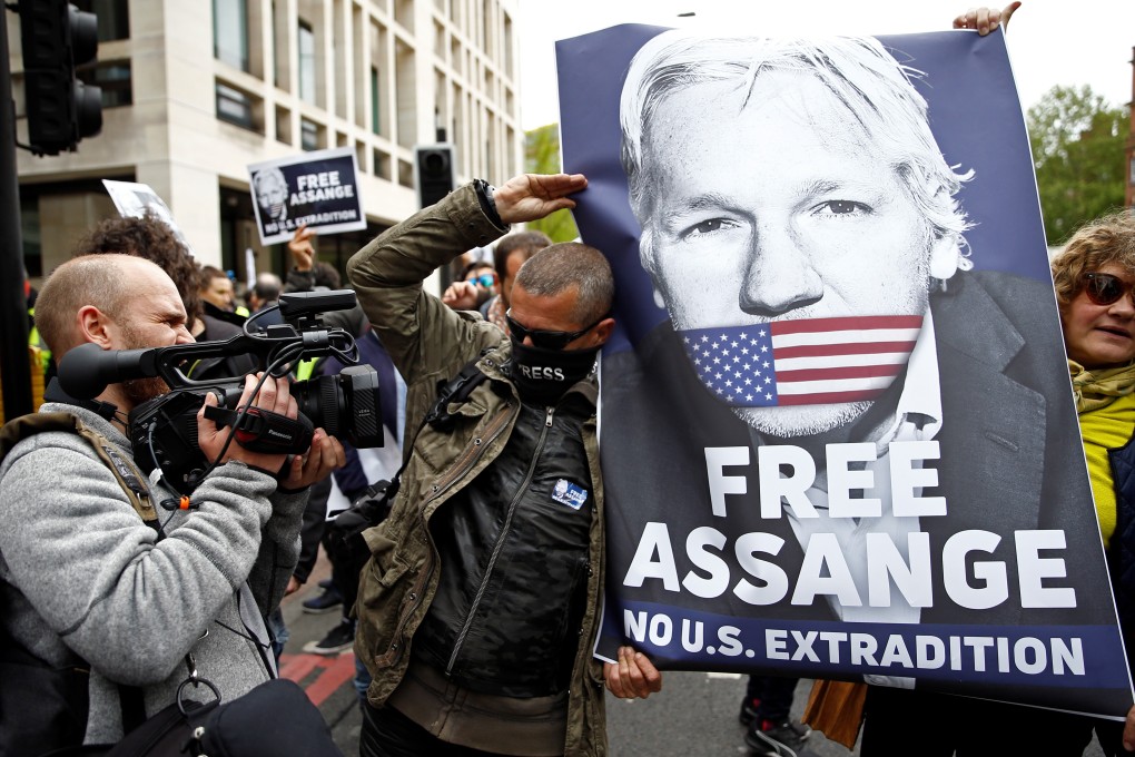 Demonstrators protest outside Westminster Magistrates Court, where WikiLeaks founder Julian Assange had a US extradition request hearing, in London. Photo: Reuters