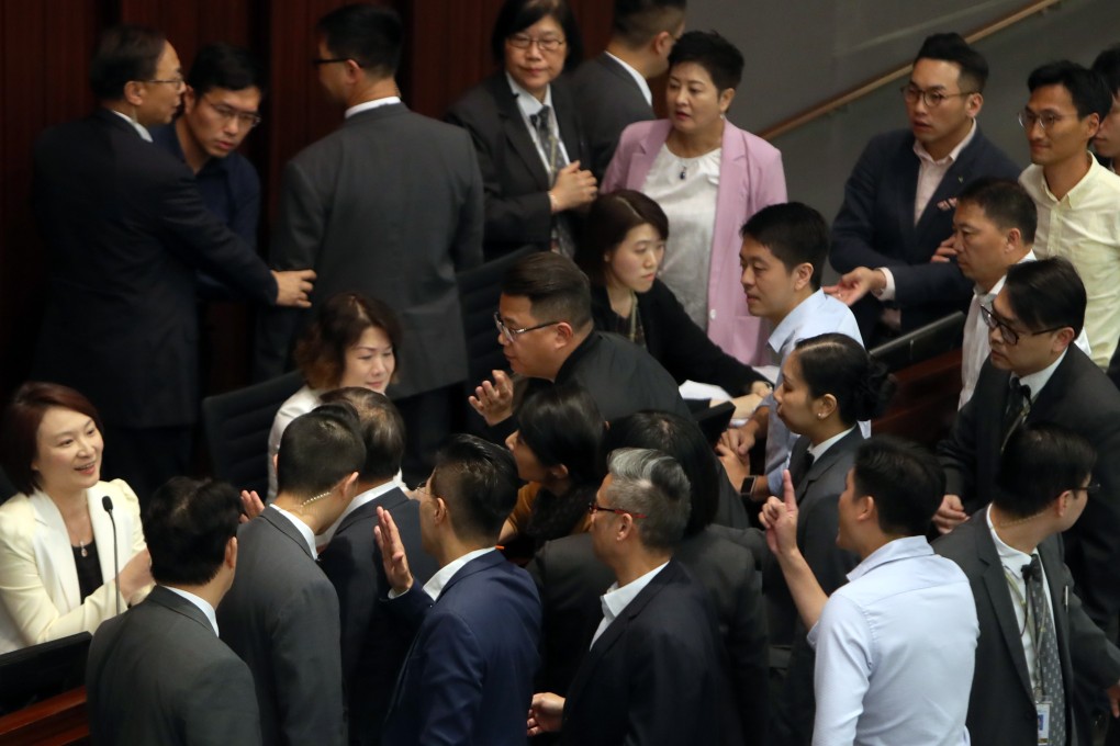 House Committee chairwoman Starry Lee (left) is surrounded by lawmakers on Saturday. Photo: Winson Wong