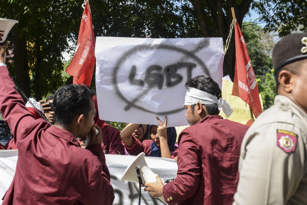 Muslim protesters march with banners against the LGBT community in Indonesia. Photo: AFP