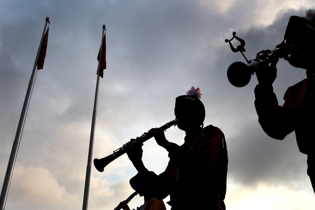 A flag-raising ceremony for a May 4 remembrance event. Photo: Felix Wong