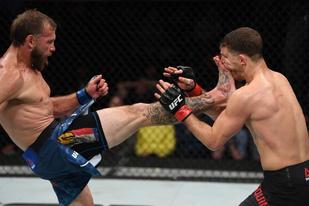 Donald Cerrone lands a kick to Al Iaquinta's face. Photo: UFC