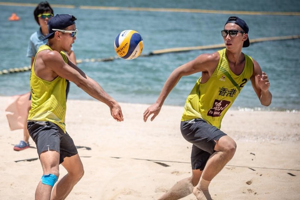 Hong Kong beach volleyball duo Kelvin Lau (right) and Wong Pui-lam playing volleyball before Lau was diagnosed with leukaemia, a cancer of the blood.