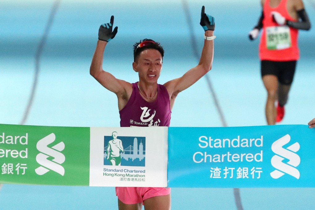 Jia Erenjia of China wins the men’s half marathon at the Hong Kong Marathon. Photo: Nora Tam