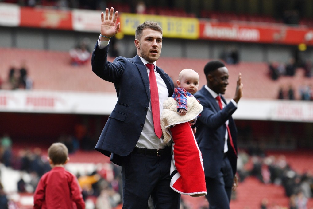 Arsenal’s Aaron Ramsey joins a lap of honour as he prepares to leave the club for Serie A giants, Juventus. Photo: EPA