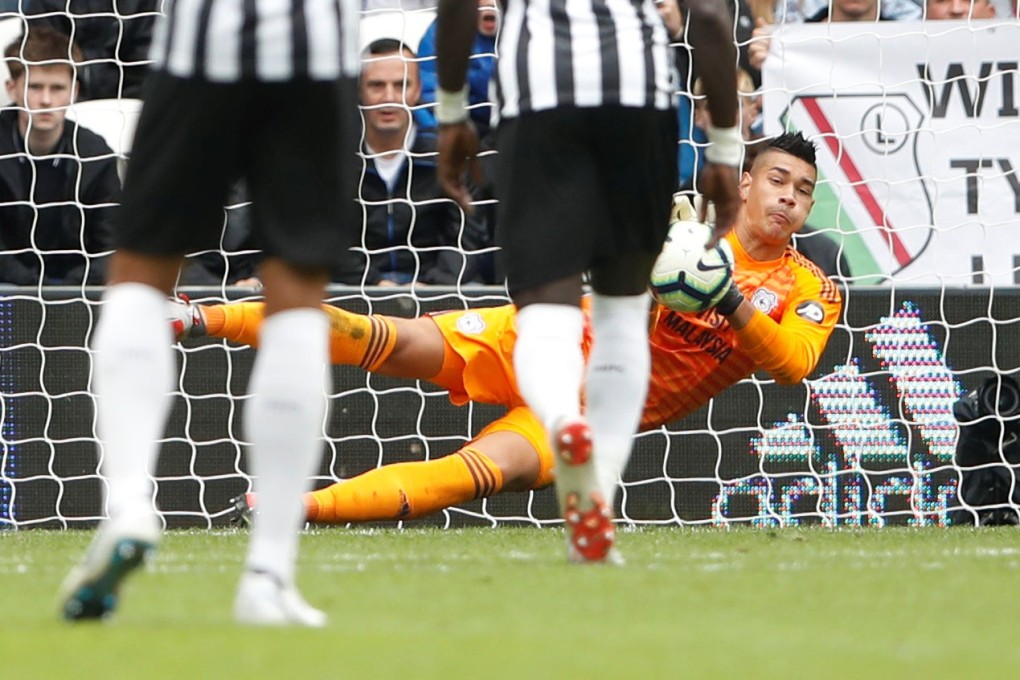 Cardiff City’s Neil Etheridge saves a penalty from Newcastle United’s Kenedy. Photo: Reuters