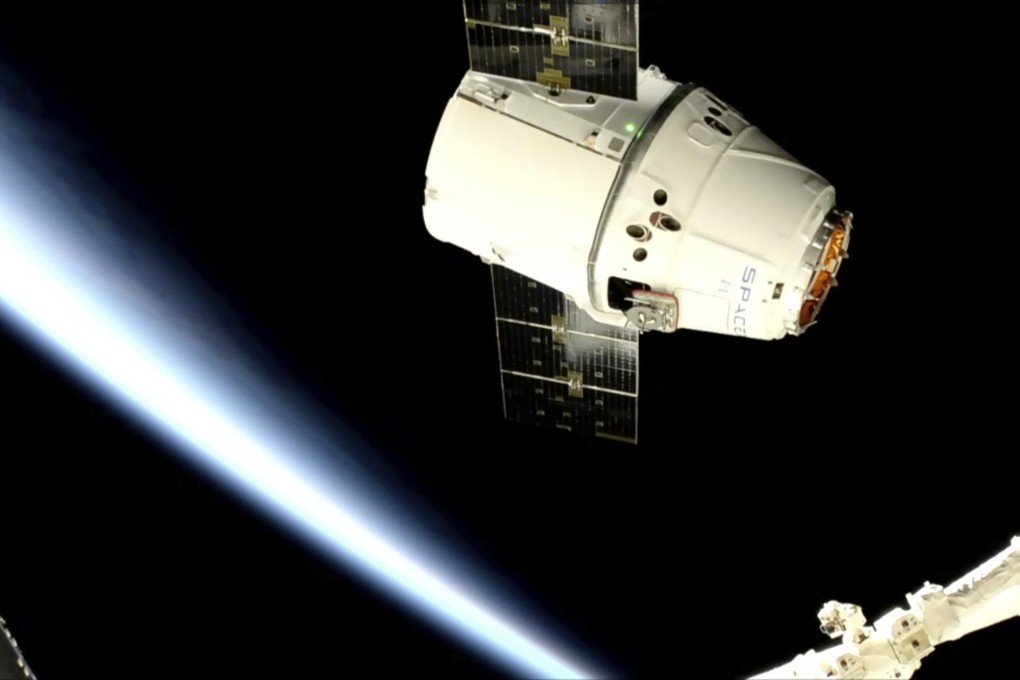 The Dragon approaching the space station. Photo: AP