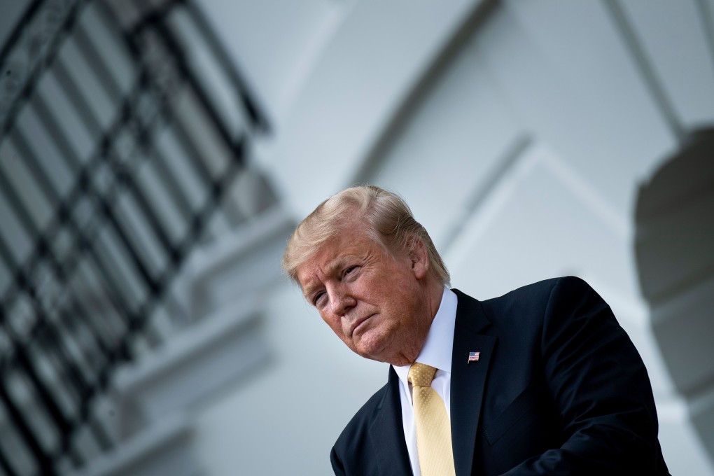 Studies have found that Donald Trump’s tariffs were almost completely passed on to US businesses and consumers. Photo: AFP