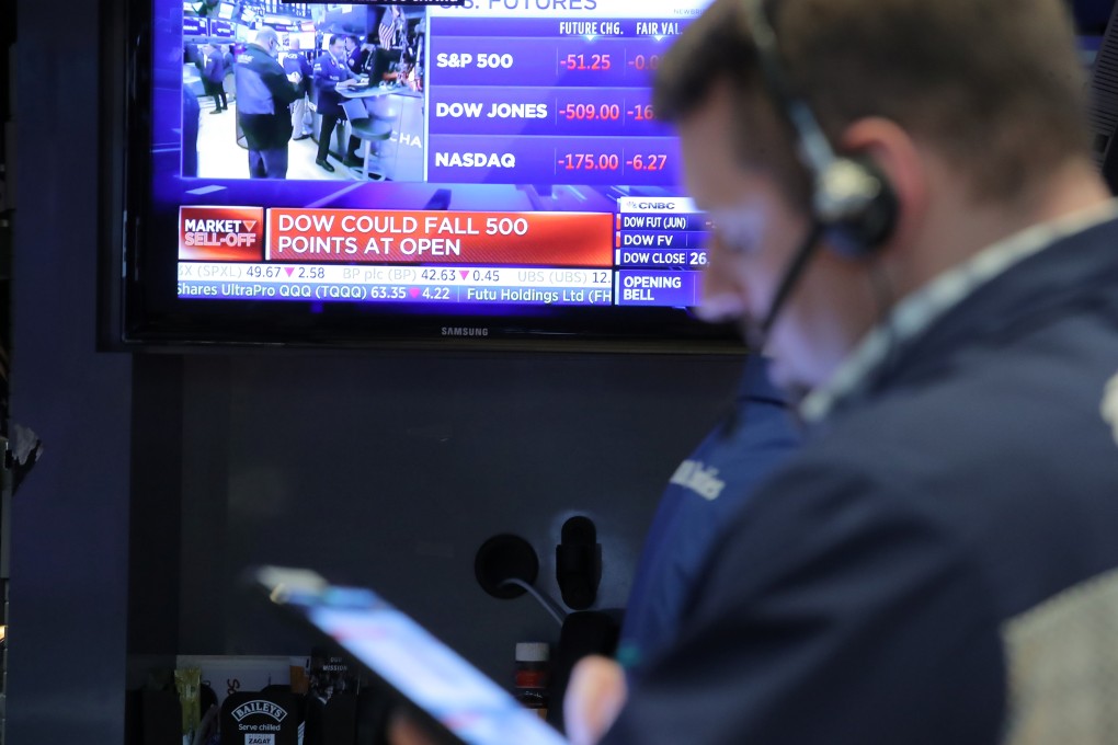 A trader works the floor at the New York Stock Exchange on Monday. Photo: Reuters
