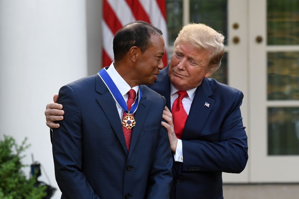 US president Donald Trump presents Tiger Woods with the Presidential Medal of Freedom during a ceremony in the Rose Garden of the White House. Photo: AFP