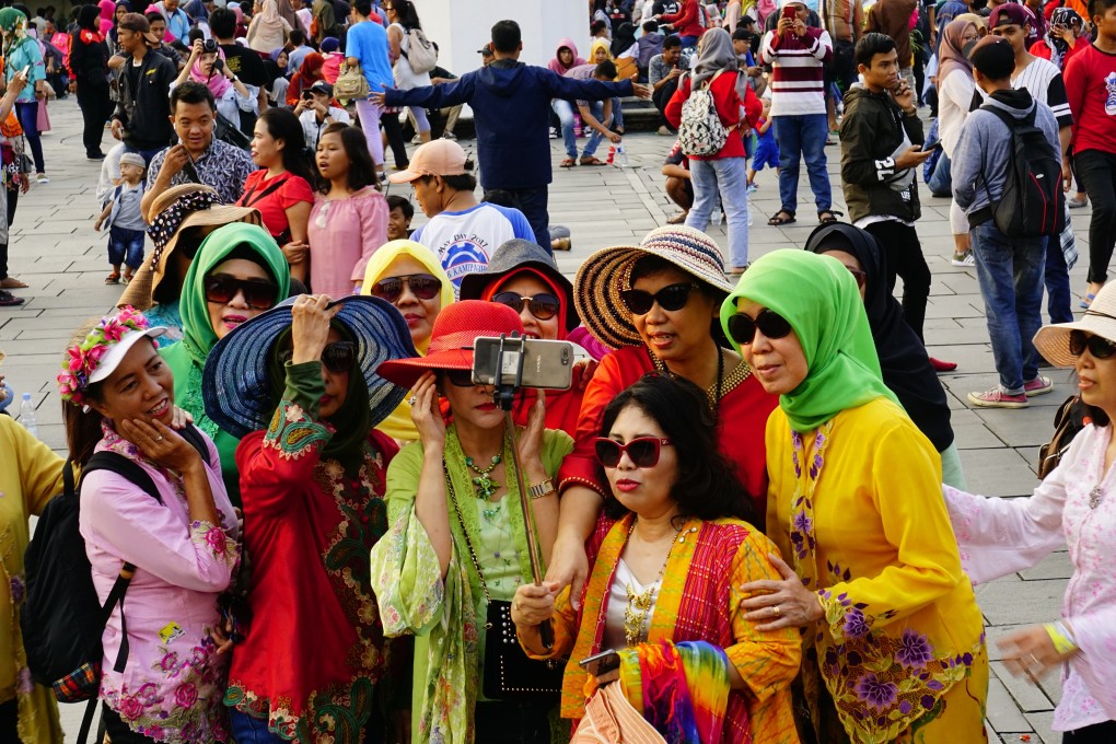 Selfie taking in the Jakarta. The Indonesian capital, a fast-rising tourist destination, is ranked the most Instagrammable city in Asia for 2019. Photo: Shutterstock