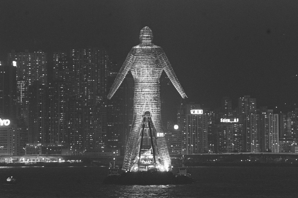 Andre Heller’s 50-metre-high sculpture, The Bamboo Man, crosses Victoria Harbour, in 1992. Photo: SCMP