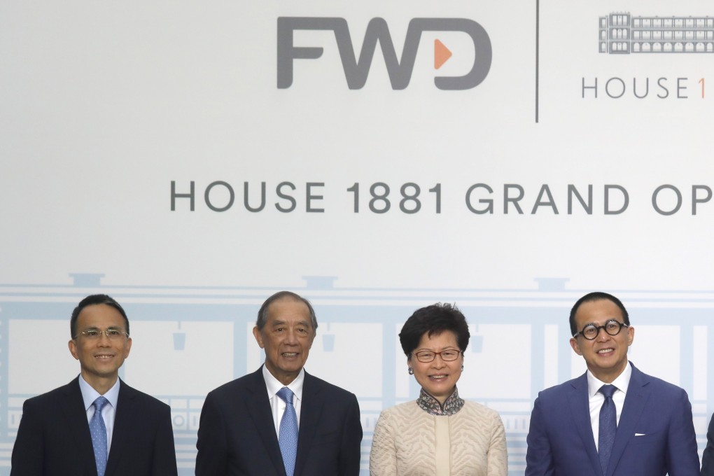 (From left) Victor Li Tzar-kuoi, Ronald Arculli, Chief Executive Carrie Lam Cheng Yuet-ngor, and Richard Li Tzar-kai, attend the opening of House 1881, in Tsim Sha Tsui, on Wednesday. Photo: Xiaomei Chen