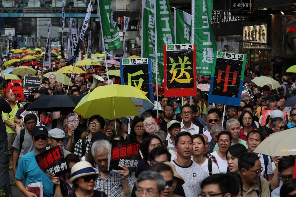 Tens of thousands take to the streets to protest against the proposal. Photo: Robert Ng