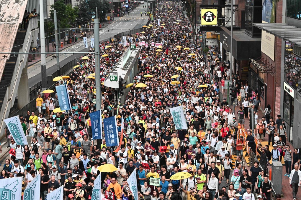 Thousands of demonstrators took to the streets in Hong Kong on April 28 to protest a proposed law that would allow extraditions to mainland China. Photo: AFP