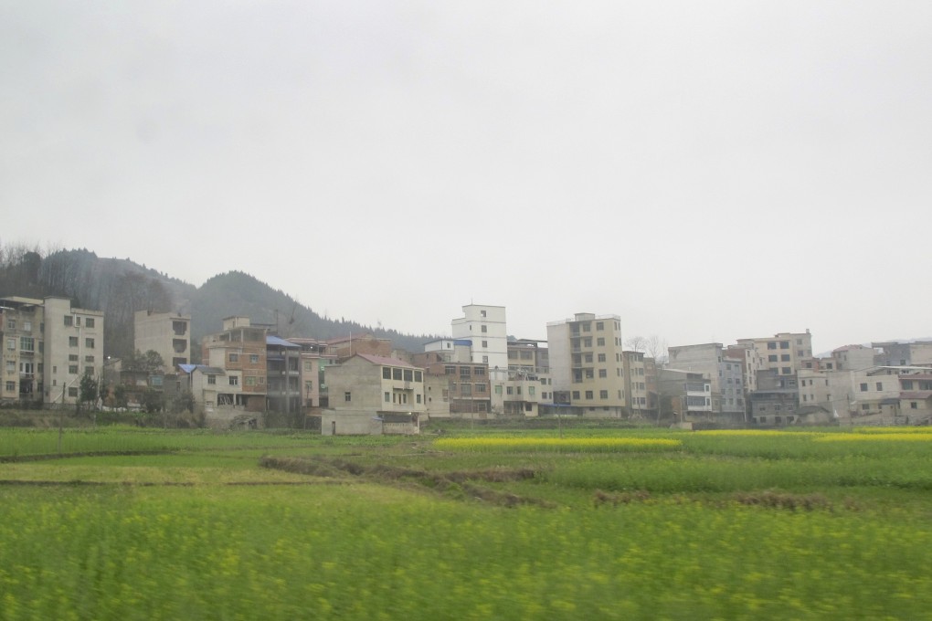 The concrete and brick buildings of Majia Zhai, a remote village in China’s Guizhou province that kept its heritage under wraps for hundreds of years. Photo: David Leffman