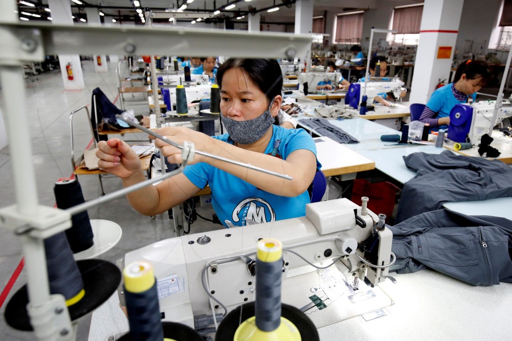 Labourers work in a garment factory in Hanoi, Vietnam. Photo: Reuters