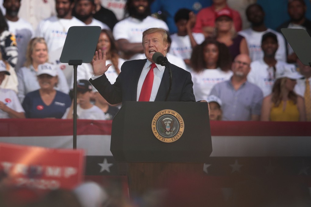 US President Donald Trump speaks during a rally in Panama City Beach, Florida. In his presidency, he has attacked the “fake news media”, questioned the impartiality of the judiciary and battled with Congress. Photo: AFP