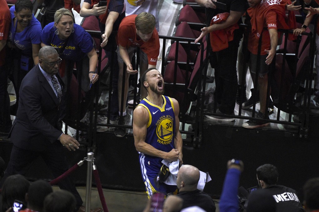Golden State Warriors' Stephen Curry celebrates as he walks off the court following the team's 118-113 win against the Houston Rockets during Game 6 of a second-round NBA basketball playoff series, Friday, May 10, 2019, in Houston. (AP Photo/Eric Christian Smith)